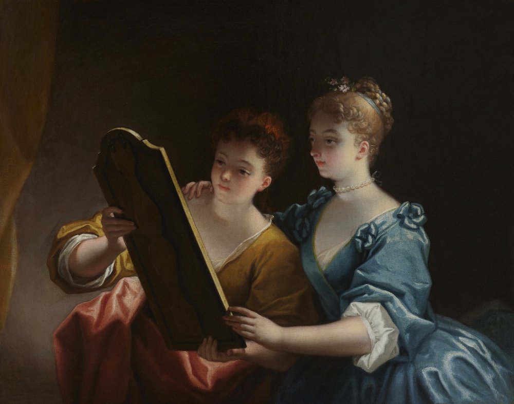 Two Young Women Looking in a Mirror