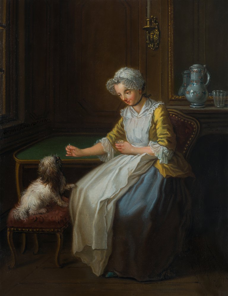 Jeune femme donnant la becquée à son chien dans un intérieur ; L’heure du&nbsp;(…)